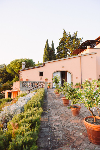 Romantic destination wedding at a pink Tuscan villa