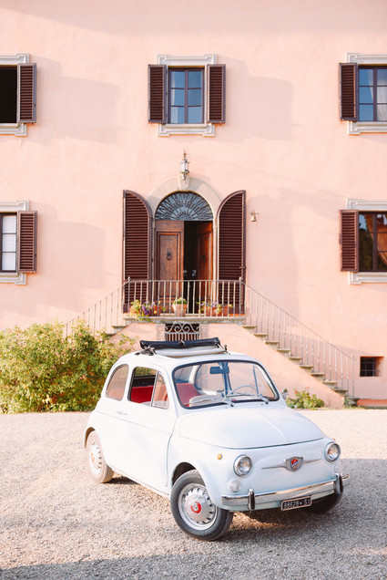 Romantic destination wedding at a pink Tuscan villa