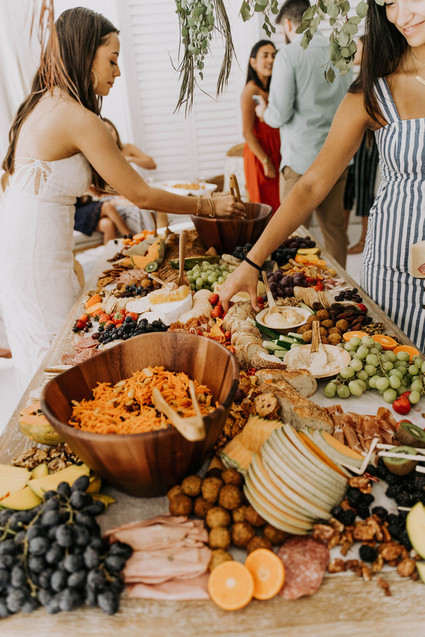All white olive branch bridal shower with an epic grazing table