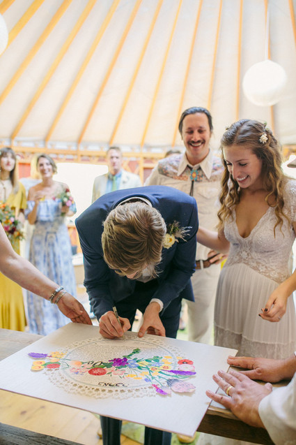 beautifully rustic Anderson Valley wedding with a hippie bus and floral mandala
