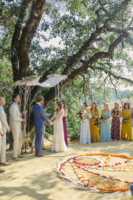 Ceremony with handmade chuppah and floral mandala Inspiration