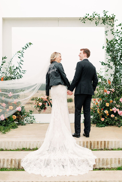 Bride with a custom leather jacket at the Prospect House in Austin Texas
