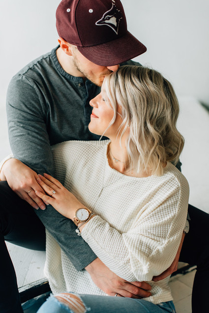 Cozy rainy day engagement photos styled at home