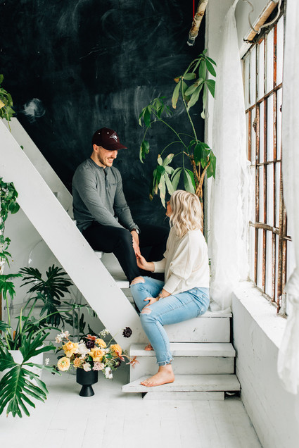 Cozy rainy day engagement photos styled at home
