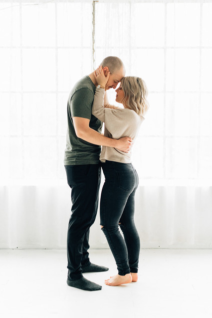 Cozy rainy day engagement photos styled at home