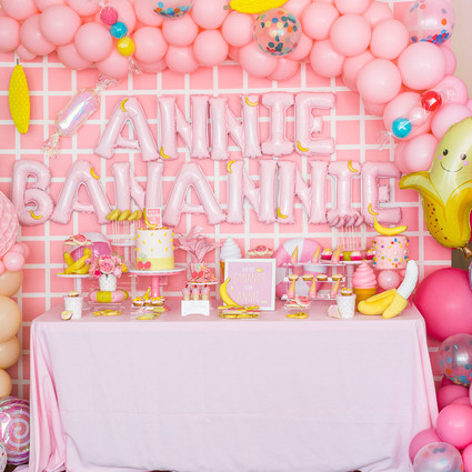 Pink and yellow Museum of Ice Cream themed first birthday party