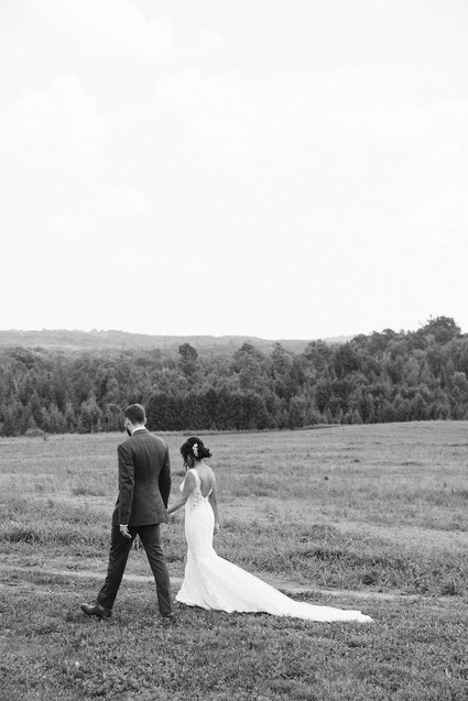 Farm to table summer wedding with pops of red and a PARADE