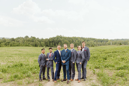 Farm to table summer wedding with pops of red and a PARADE