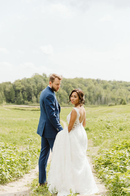 Farm to table summer wedding with pops of red and a PARADE