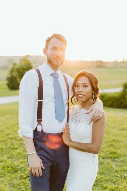 Farm to table summer barn wedding with pops of red and a PARADE
