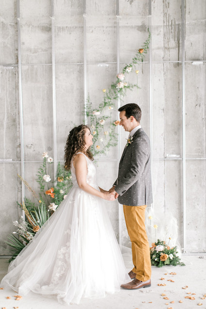 mustard and grey wedding fashion for bride and groom