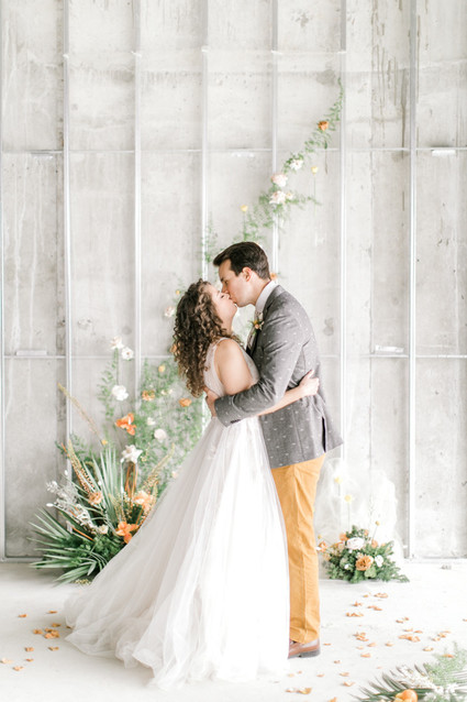 mustard and grey wedding fashion for bride and groom
