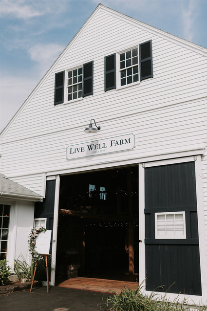 Green and white Maine barn wedding