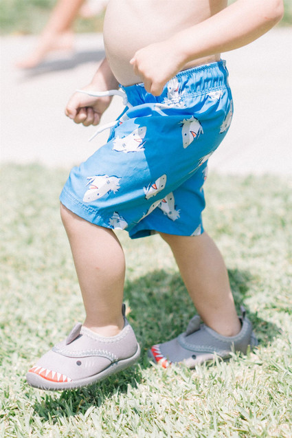 Sharks and mermaids joint birthday pool party