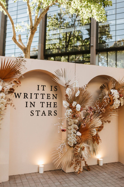 Palm leaf wedding backdrop Inspiration