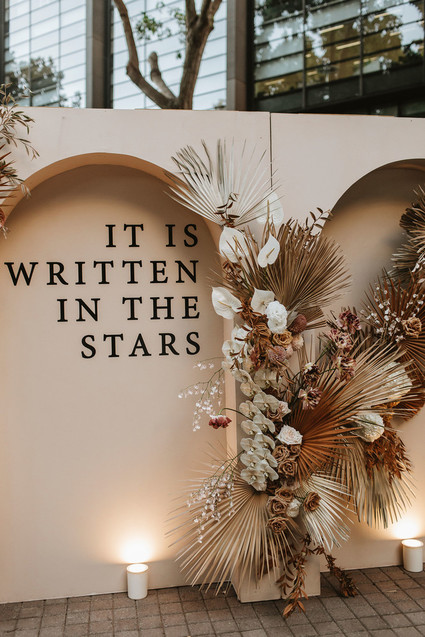 Palm leaf wedding backdrop Inspiration