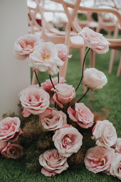 Gorgeous pink roses for wedding aisle