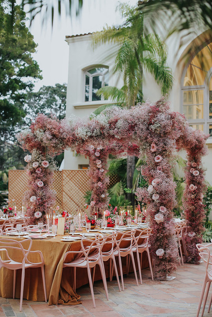 Pink babies breath wedding arch