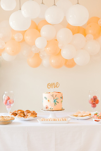 peach 1st birthday cake