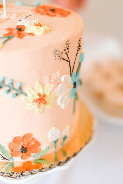 floral peach 1st birthday cake