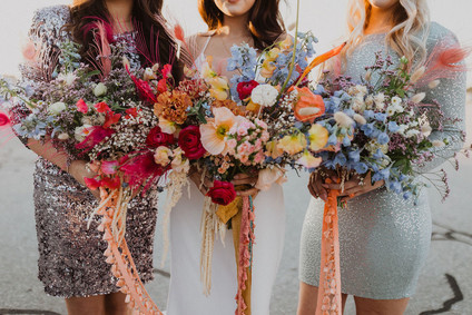 colorful bridal bouquet with feathers