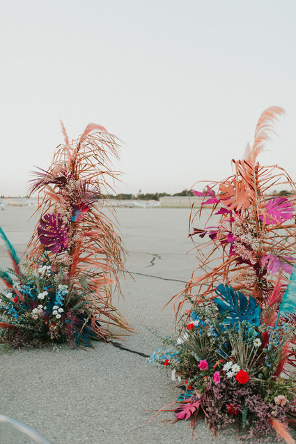 colorful ceremony flowers with feathers