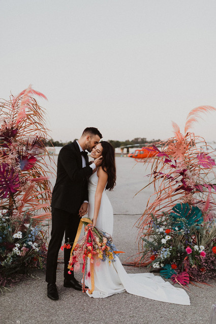 colorful ceremony flowers with feathers