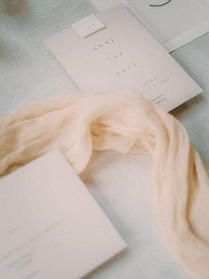 white and blush wedding stationery