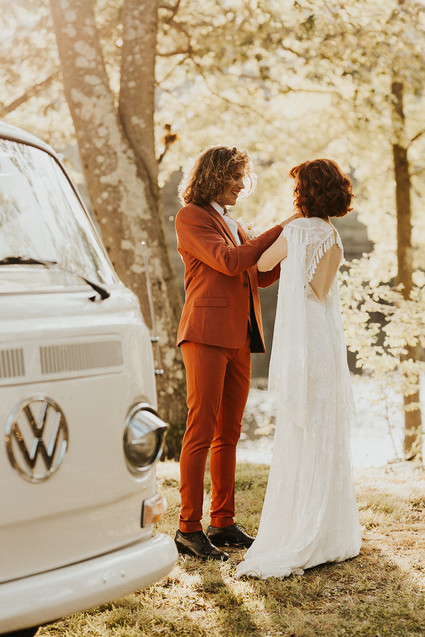 rust colored groom's suit