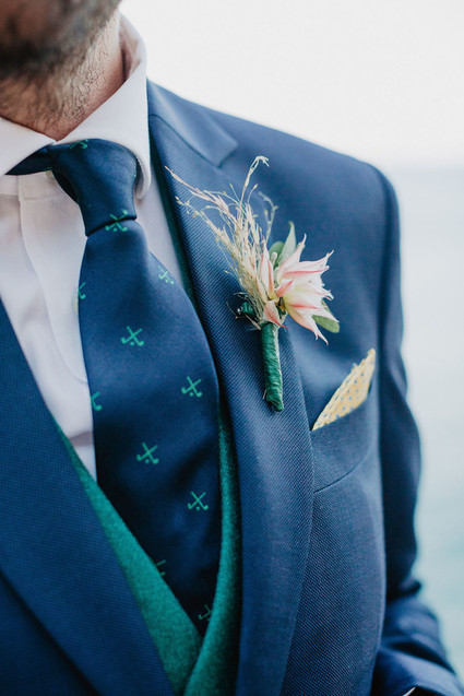 green and blue grooms suit