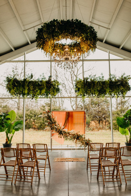lush modern boho wedding ceremony floral installation