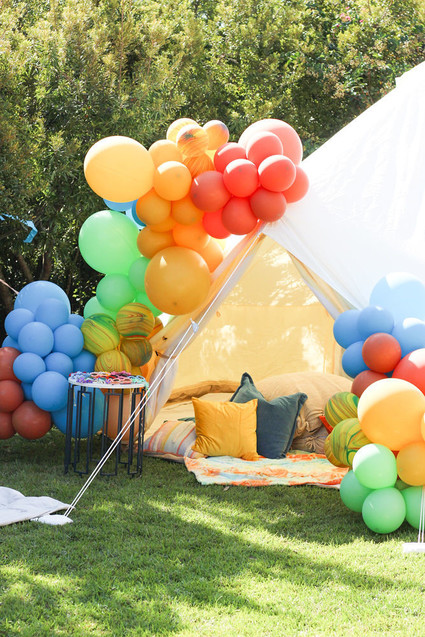 Groovy rainbow themed second birthday party Inspiration