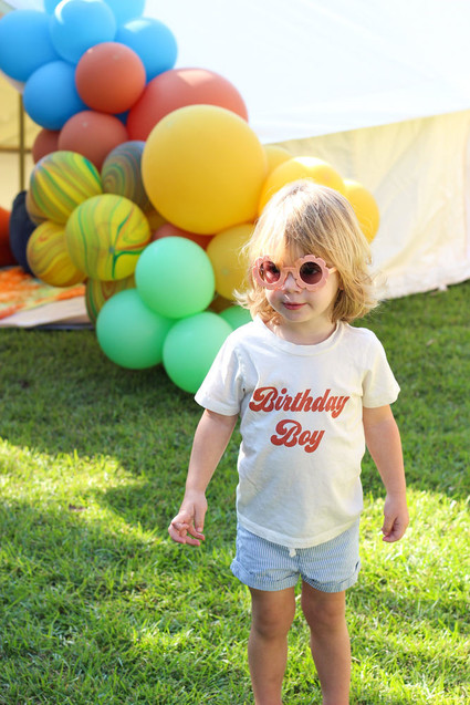 Groovy rainbow themed second birthday party Inspiration
