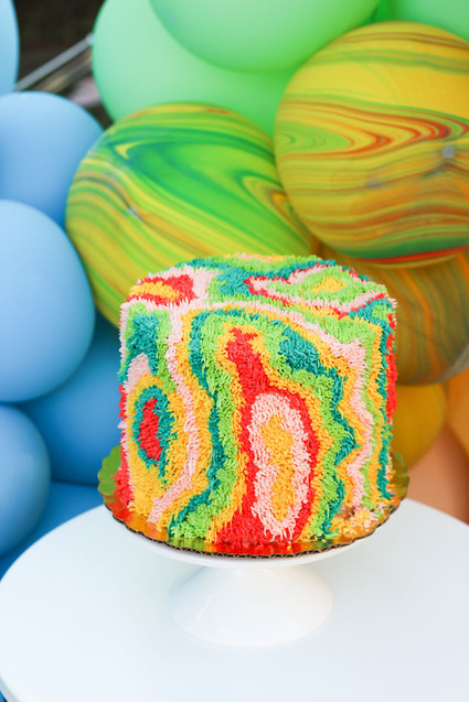 Groovy rainbow themed second birthday party Inspiration