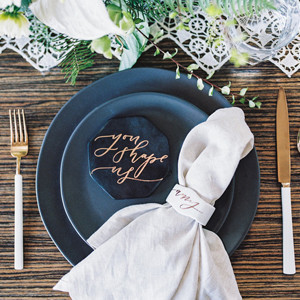 Modern black, white, and gold rehearsal dinner