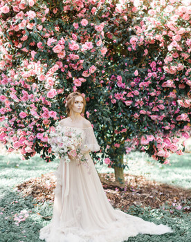 A stunning bridal editorial with a giant pink camellia tree