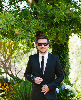 Modern black grooms suit