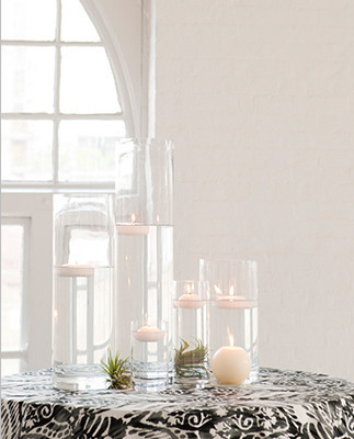 Floating Candles and Hurricane Vase Reception Decor