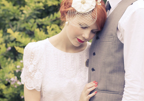 Bridal floral headpiece detail and lace dress