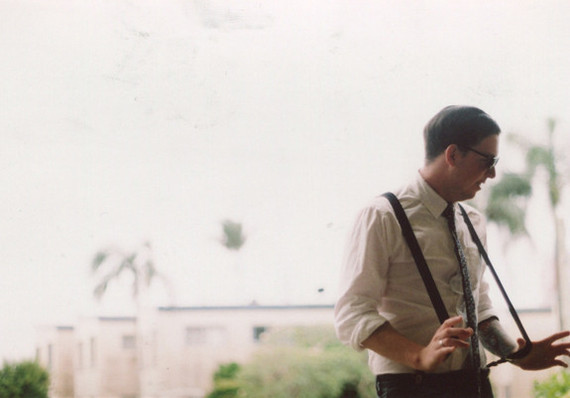 Suspender wearing groom detail