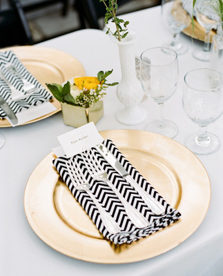 Gold plates and chevron napkins