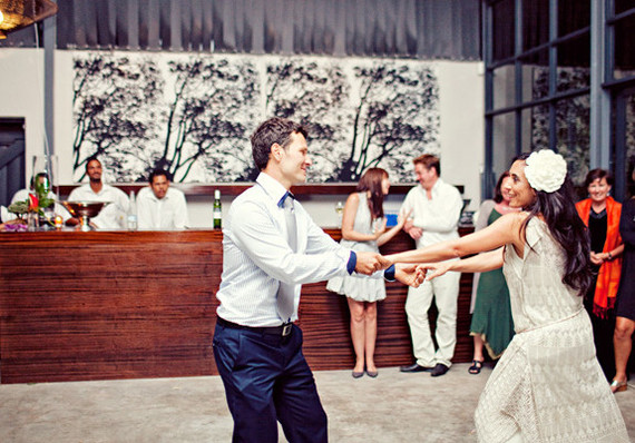 Bride and groom cheery first dance