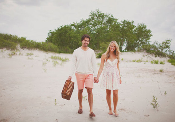 Couple casually dressed on the beach
