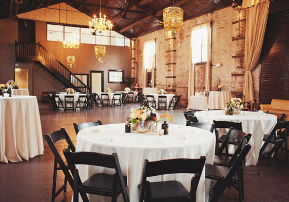 Black Chairs and Gold Chandeliers