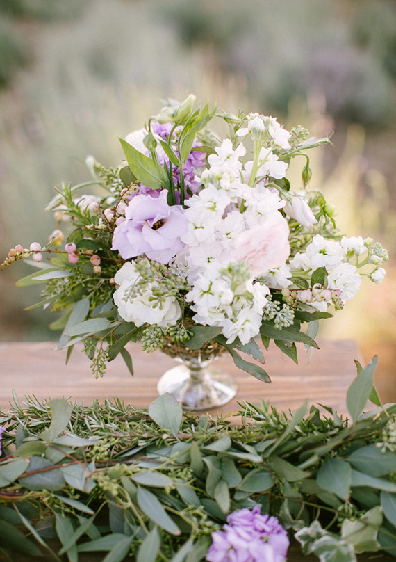 Purple and white floral centerpiece