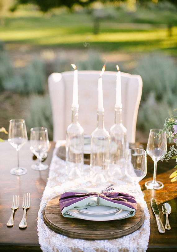 Clear vases with white candles