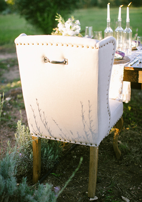 White and gold studded chair