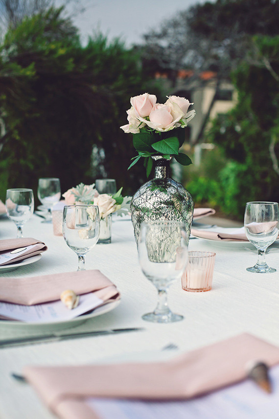 Silver vase with pink roses