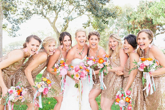 Bridesmaid with bouquets and gold dresses