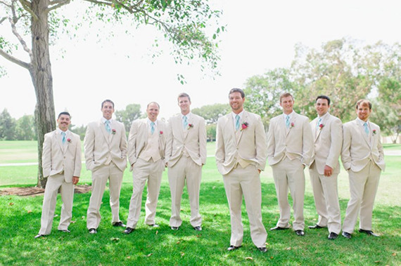 Groomsmen in light grey suits